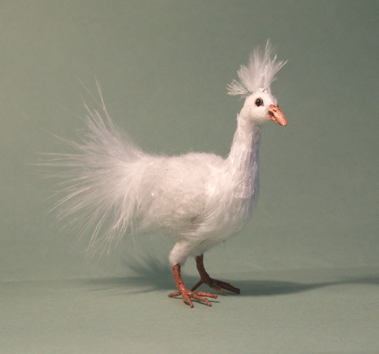 Dolls house feathered peahen (peacock)